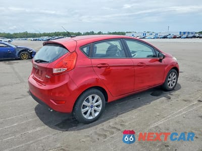 Trzecie zdjęcie samochodu z tyłu: 2011 FORD FIESTA SE VIN:3FADP4EJ8BM232325 - miniatura