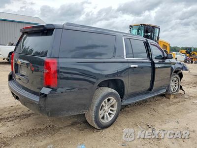 Trzecie zdjęcie samochodu z tyłu: 2019 CHEVROLET SUBURBAN C1500 LT VIN:1GNSCHKC5KR362238 - miniatura