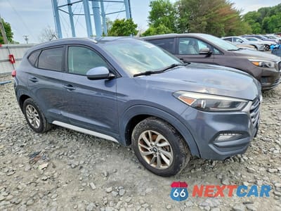 Czwarte zdjęcie samochodu z boku: 2017 HYUNDAI TUCSON SE VIN:KM8J3CA49HU496768 - miniatura