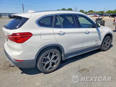 Trzecie zdjęcie samochodu z tyłu: 2016 BMW X1 XDRIVE28I VIN:WBXHT3C35GP880778 - miniatura
