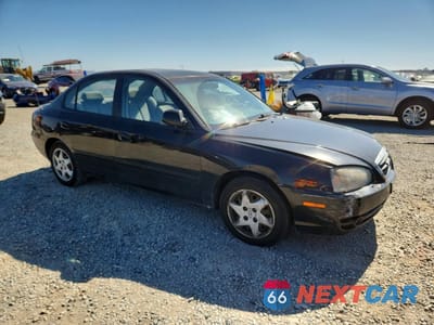 Czwarte zdjęcie samochodu z boku: 2005 HYUNDAI ELANTRA GLS VIN:KMHDN46D95U000501 - miniatura
