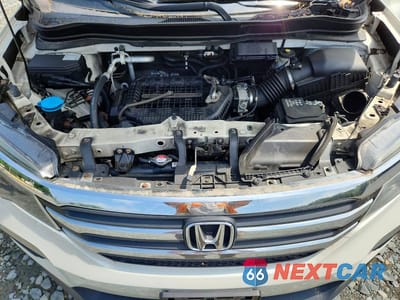 Zdjęcie 12 z 13 samochodu: 2016 HONDA PILOT EXL VIN:5FNYF6H52GB054206 - miniatura