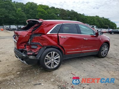 Trzecie zdjęcie samochodu z tyłu: 2023 CADILLAC XT5 PLATINUM PREMIUM LUXURY VIN:1GYKNERS8PZ116560 - miniatura
