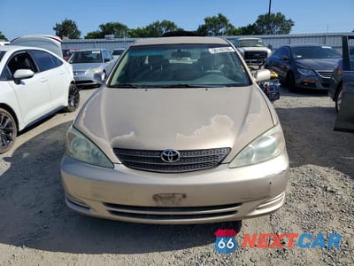 Piąte zdjęcie samochodu w środku: 2003 TOYOTA CAMRY LE VIN:4T1BE32K83U154894 - miniatura