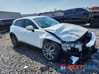 Czwarte zdjęcie samochodu z boku: 2017 MAZDA CX-3 TOURING VIN:JM1DKDC78H0147867 - miniatura