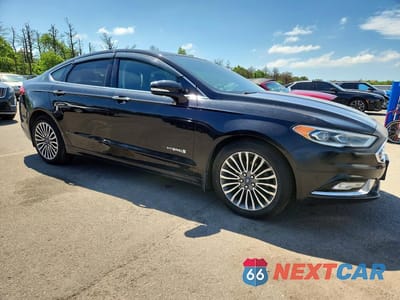 Czwarte zdjęcie samochodu z boku: 2018 FORD FUSION TITANIUM VIN:3FA6P0RU5JR206790 - miniatura