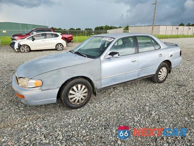 1995 TOYOTA CAMRY LE 4T1SK12E7SU869171 - główne zdjęcie licytacji z USA - miniatura