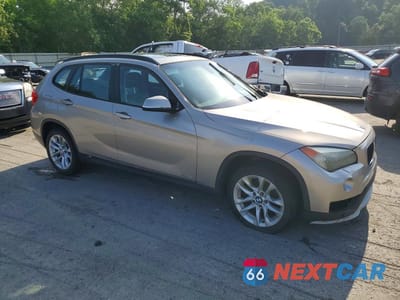 Czwarte zdjęcie samochodu z boku: 2015 BMW X1 XDRIVE28I VIN:WBAVL1C52FVY29204 - miniatura