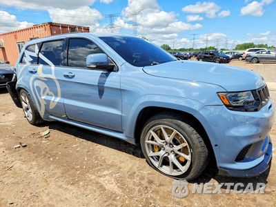 Czwarte zdjęcie samochodu z boku: 2018 JEEP GRAND CHEROKEE TRACKHAWK VIN:1C4RJFN97JC283849 - miniatura