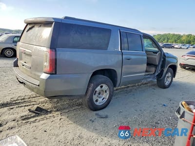 Trzecie zdjęcie samochodu z tyłu: 2018 GMC YUKON XL C1500 SLT VIN:1GKS1GKC1JR293706 - miniatura