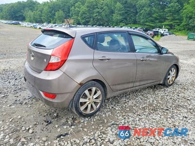 Trzecie zdjęcie samochodu z tyłu: 2012 HYUNDAI ACCENT SE VIN:KMHCU5AE1CU012725 - miniatura