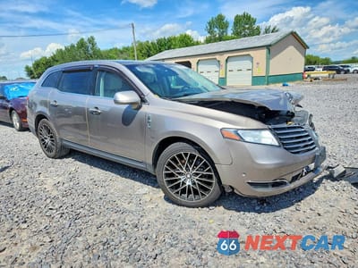 Czwarte zdjęcie samochodu z boku: 2019 LINCOLN MKT VIN:2LMHJ5AT5KBL00995 - miniatura