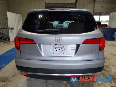 Zdjęcie 6 z 12 samochodu: 2016 HONDA PILOT ELITE VIN:5FNYF6H06GB016241 - miniatura