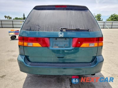 Zdjęcie 6 z 13 samochodu: 2002 HONDA ODYSSEY EX VIN:2HKRL18602H519343 - miniatura