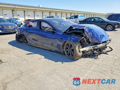 Czwarte zdjęcie samochodu z boku: 2022 TESLA MODEL S VIN:5YJSA1E62NF485811 - miniatura