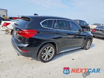 Trzecie zdjęcie samochodu z tyłu: 2017 BMW X1 XDRIVE28I VIN:WBXHT3Z30H4A53655 - miniatura