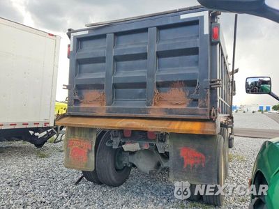 Czwarte zdjęcie samochodu z boku: 2000 VOLVO WG DUMP TRUCK VIN:4V5JC2UF1YN869307 - miniatura