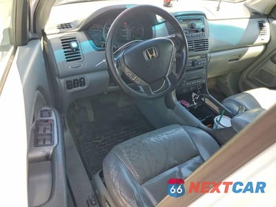 Zdjęcie 8 z 13 samochodu: 2005 HONDA PILOT EXL VIN:2HKYF186X5H551739 - miniatura