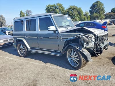 Czwarte zdjęcie samochodu z boku: 2002 MERCEDES-BENZ G 500 BRABUS VIN:WDCYR49E62X128102 - miniatura