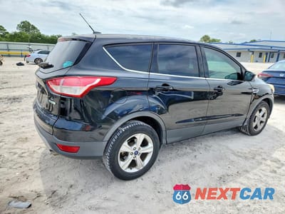 Trzecie zdjęcie samochodu z tyłu: 2014 FORD ESCAPE SE VIN:1FMCU0GX4EUC34819 - miniatura