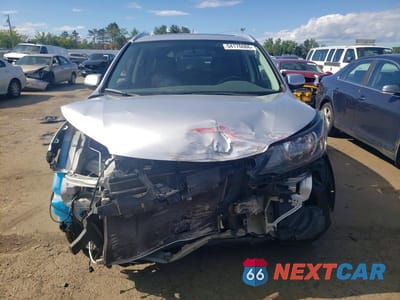 Piąte zdjęcie samochodu w środku: 2012 HONDA CR-V EXL VIN:2HKRM4H74CH610379 - miniatura