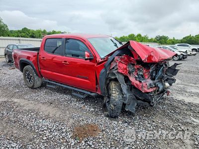 Czwarte zdjęcie samochodu z boku: 2021 TOYOTA TACOMA TRD OFF-ROAD VIN:3TYCZ5AN0MT040371 - miniatura