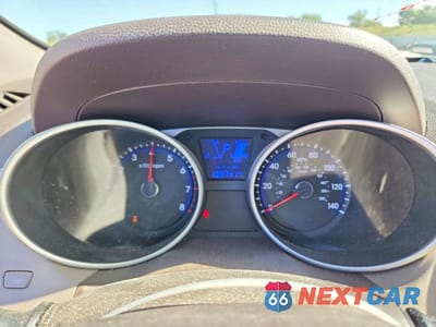 Zdjęcie 9 z 12 samochodu: 2013 HYUNDAI TUCSON GLS VIN:KM8JUCAC6DU629369 - miniatura