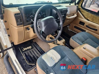 Zdjęcie 8 z 12 samochodu: 1999 JEEP WRANGLER / TJ SAHARA VIN:1J4FY49S9XP465466 - miniatura