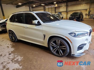 Czwarte zdjęcie samochodu z boku: 2016 BMW X5 M VIN:5YMKT6C50G0R78137 - miniatura
