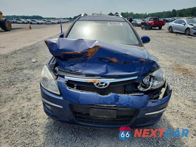Piąte zdjęcie samochodu w środku: 2012 HYUNDAI ELANTRA TOURING SE VIN:KMHDC8AEXCU146397 - miniatura
