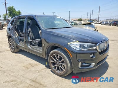 Czwarte zdjęcie samochodu z boku: 2018 BMW X5 XDR40E VIN:5UXKT0C54J0W03024 - miniatura