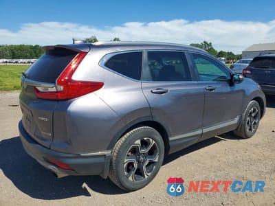 Trzecie zdjęcie samochodu z tyłu: 2018 HONDA CR-V TOURING VIN:7FARW2H90JE099124 - miniatura