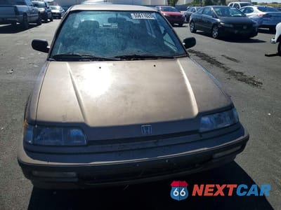 Piąte zdjęcie samochodu w środku: 1990 HONDA CIVIC LX VIN:1HGED3657LL026629 - miniatura