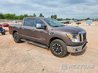 Czwarte zdjęcie samochodu z boku: 2017 NISSAN TITAN SL VIN:1N6AA1E56HN511283 - miniatura