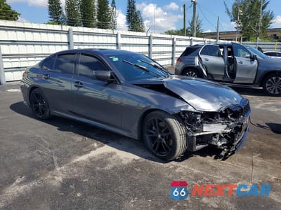 Czwarte zdjęcie samochodu z boku: 2022 BMW 330I VIN:3MW5R1J02N8C46445 - miniatura