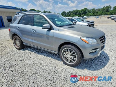 Czwarte zdjęcie samochodu z boku: 2014 MERCEDES-BENZ ML 350 BLUETEC VIN:4JGDA2EB2EA319899 - miniatura