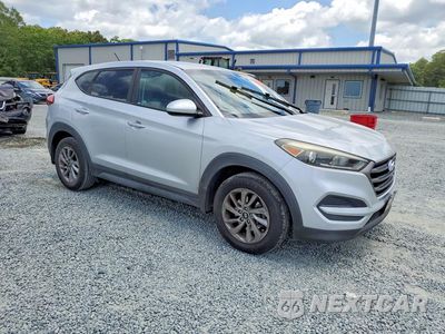 Czwarte zdjęcie samochodu z boku: 2016 HYUNDAI TUCSON SE VIN:KM8J23A42GU161644 - miniatura