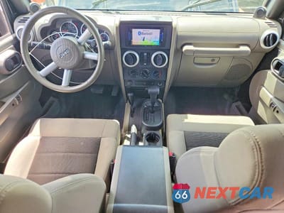 Zdjęcie 8 z 13 samochodu: 2010 JEEP WRANGLER UNLIMITED SAHARA VIN:1J4BA5H18AL205639 - miniatura