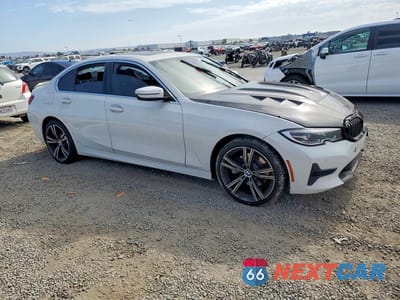 Czwarte zdjęcie samochodu z boku: 2021 BMW 330I VIN:3MW5R1J08M8C13562 - miniatura
