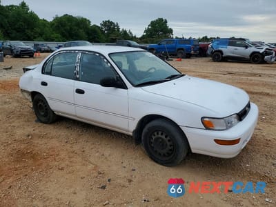 Czwarte zdjęcie samochodu z boku: 1994 TOYOTA COROLLA BASE VIN:1NXAE04B5RZ151483 - miniatura
