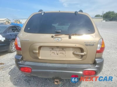 Zdjęcie 6 z 14 samochodu: 2003 HYUNDAI SANTA FE VIN:KM8SB12B63U429370 - miniatura