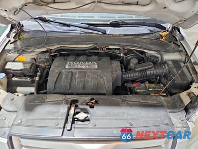 Zdjęcie 12 z 13 samochodu: 2006 HONDA PILOT EX VIN:5FNYF28706B009418 - miniatura
