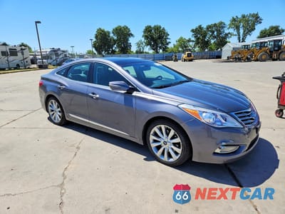 Czwarte zdjęcie samochodu z boku: 2013 HYUNDAI AZERA VIN:KMHFH4JG5DA254790 - miniatura