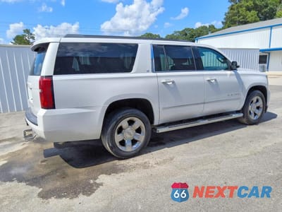 Trzecie zdjęcie samochodu z tyłu: 2016 CHEVROLET SUBURBAN C1500 LT VIN:1GNSCHKC1GR454227 - miniatura