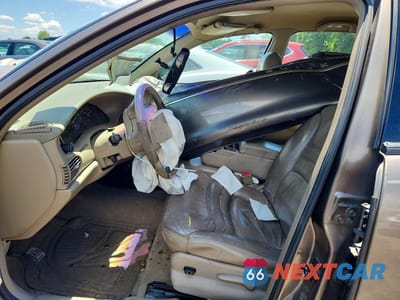 Zdjęcie 7 z 13 samochodu: 2002 BUICK CENTURY LIMITED VIN:2G4WY55J021168483 - miniatura