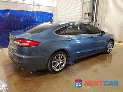 Trzecie zdjęcie samochodu z tyłu: 2019 FORD FUSION SEL VIN:3FA6P0CD6KR140499 - miniatura
