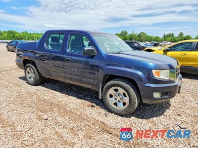 Czwarte zdjęcie samochodu z boku: 2011 HONDA RIDGELINE RT VIN:5FPYK1F21BB005036 - miniatura