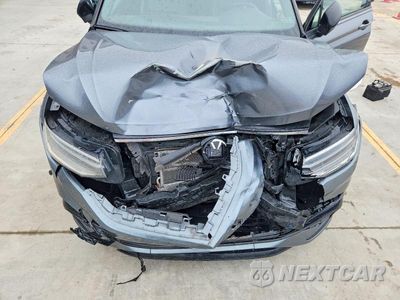 Zdjęcie 12 z 13 samochodu: 2022 VOLKSWAGEN TIGUAN SE R-LINE BLACK VIN:3VVCB7AX9NM064555 - miniatura