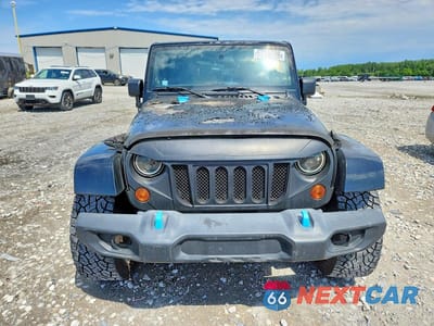 Piąte zdjęcie samochodu w środku: 2011 JEEP WRANGLER UNLIMITED JEEP 70TH ANNIVERSARY VIN:1J4BA7H13BL590878 - miniatura
