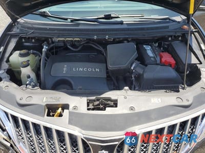 Zdjęcie 12 z 13 samochodu: 2013 LINCOLN MKX VIN:2LMDJ6JK5DBL35955 - miniatura